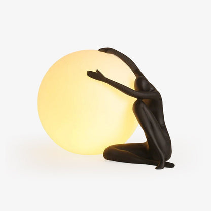 Humanoid Ball Holding Table Lamp Table lamp