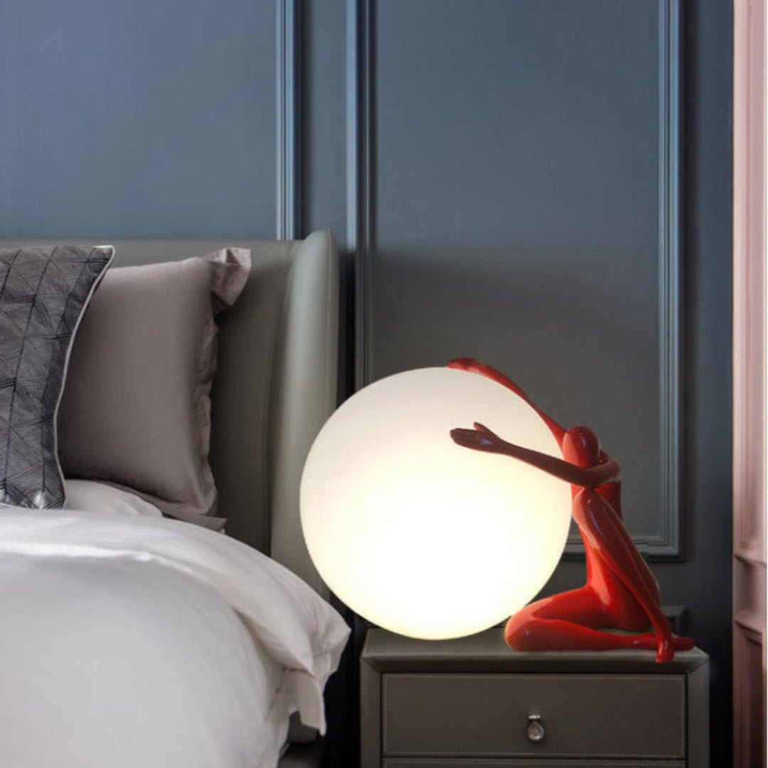 Humanoid Ball Holding Table Lamp Table lamp