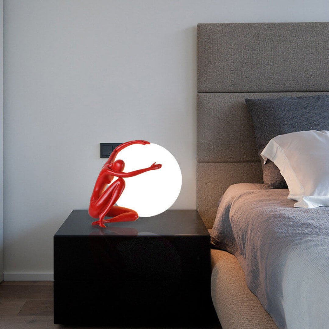 Humanoid Ball Holding Table Lamp Table lamp