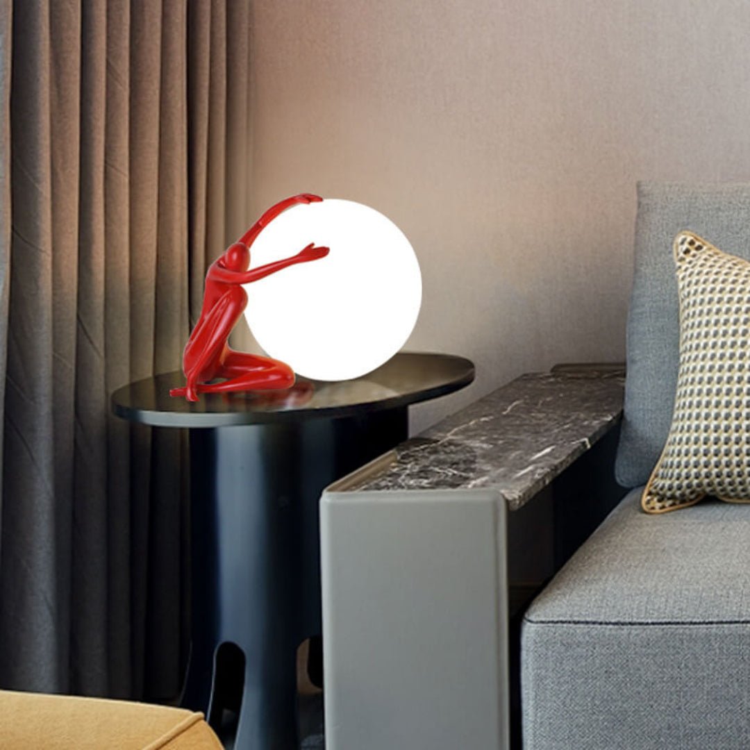 Humanoid Ball Holding Table Lamp Table lamp