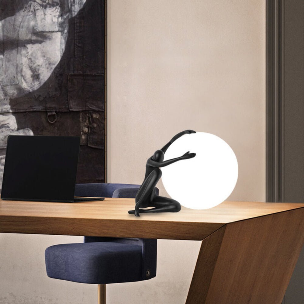Humanoid Ball Holding Table Lamp Table lamp