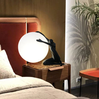 Humanoid Ball Holding Table Lamp Table lamp