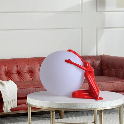Humanoid Ball Holding Table Lamp Table lamp