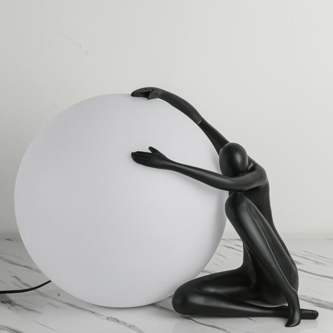 Humanoid Ball Holding Table Lamp Table lamp