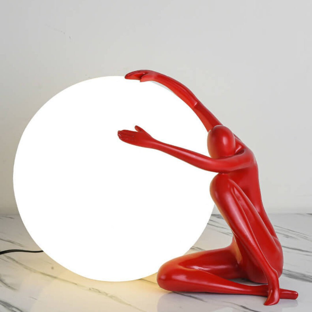 Humanoid Ball Holding Table Lamp Table lamp