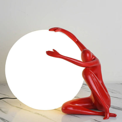 Humanoid Ball Holding Table Lamp Table lamp