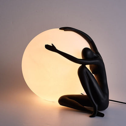 Humanoid Ball Holding Table Lamp Table lamp