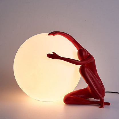 Humanoid Ball Holding Table Lamp Table lamp