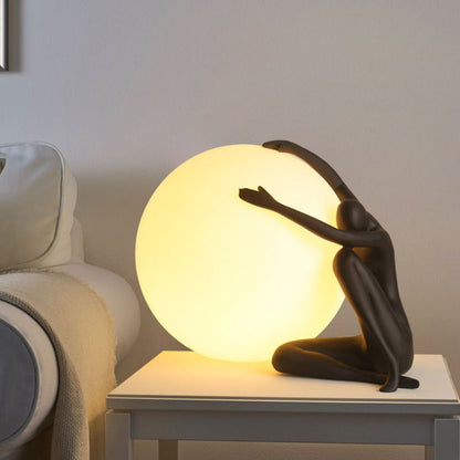 Humanoid Ball Holding Table Lamp Table lamp