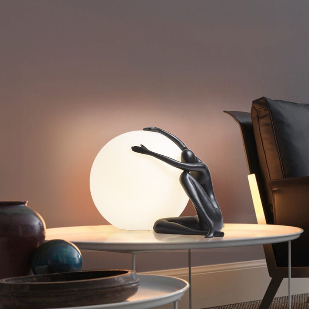 Humanoid Ball Holding Table Lamp Table lamp