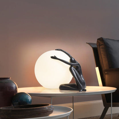 Humanoid Ball Holding Table Lamp Table lamp
