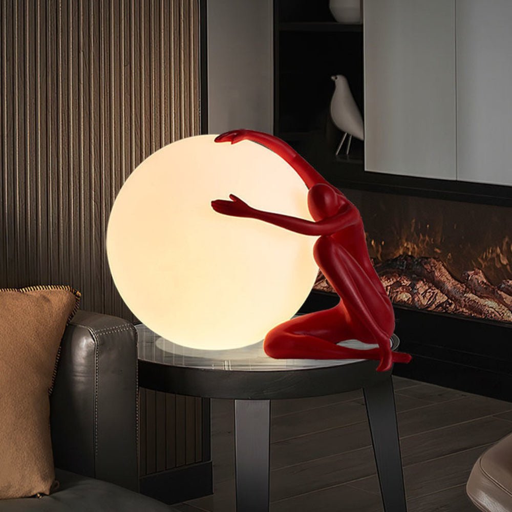 Humanoid Ball Holding Table Lamp Table lamp