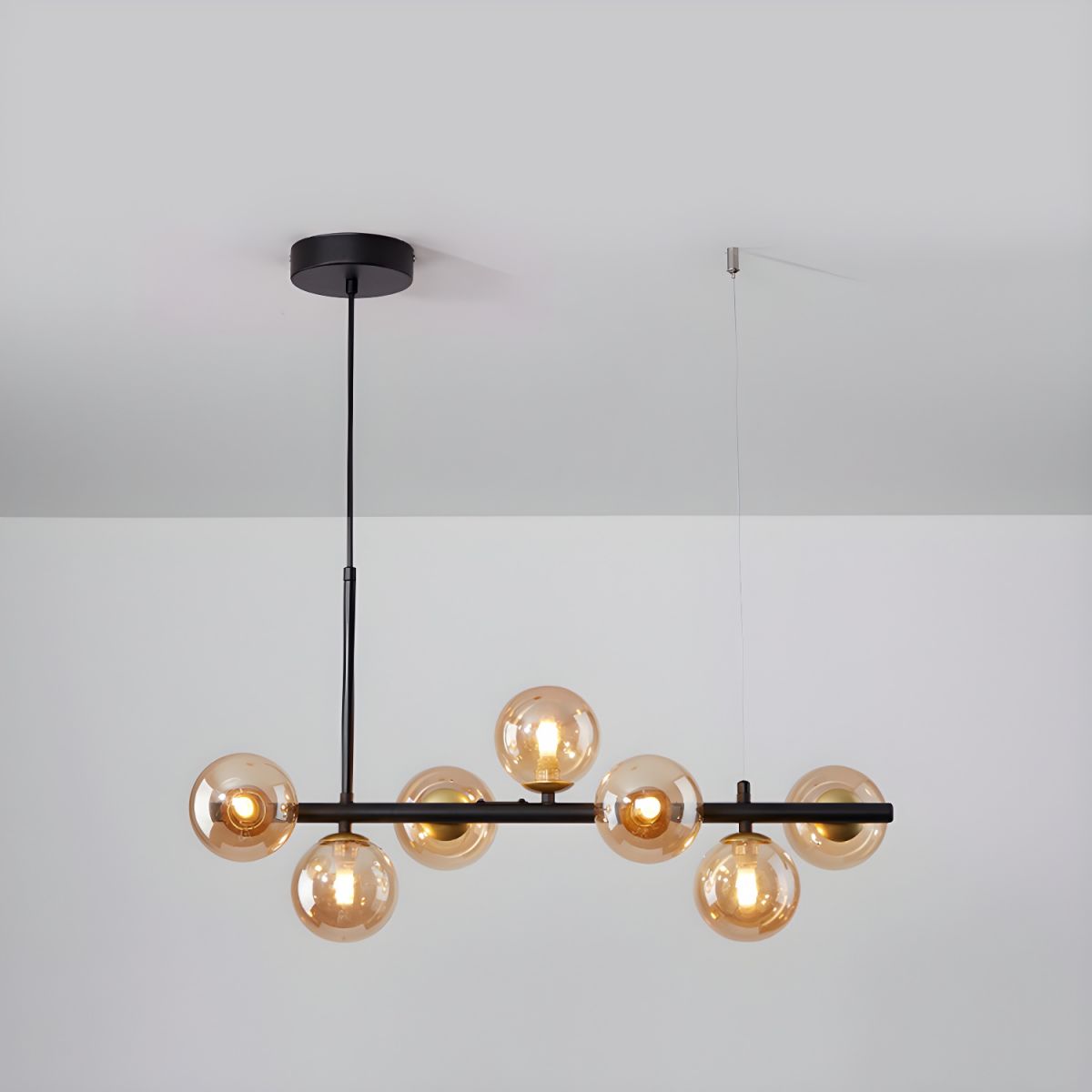 Aurelia Globe Chandelier 7-balls: ? 25.6″ x H 9.4″ / Black / Amber 1001 Chandelier