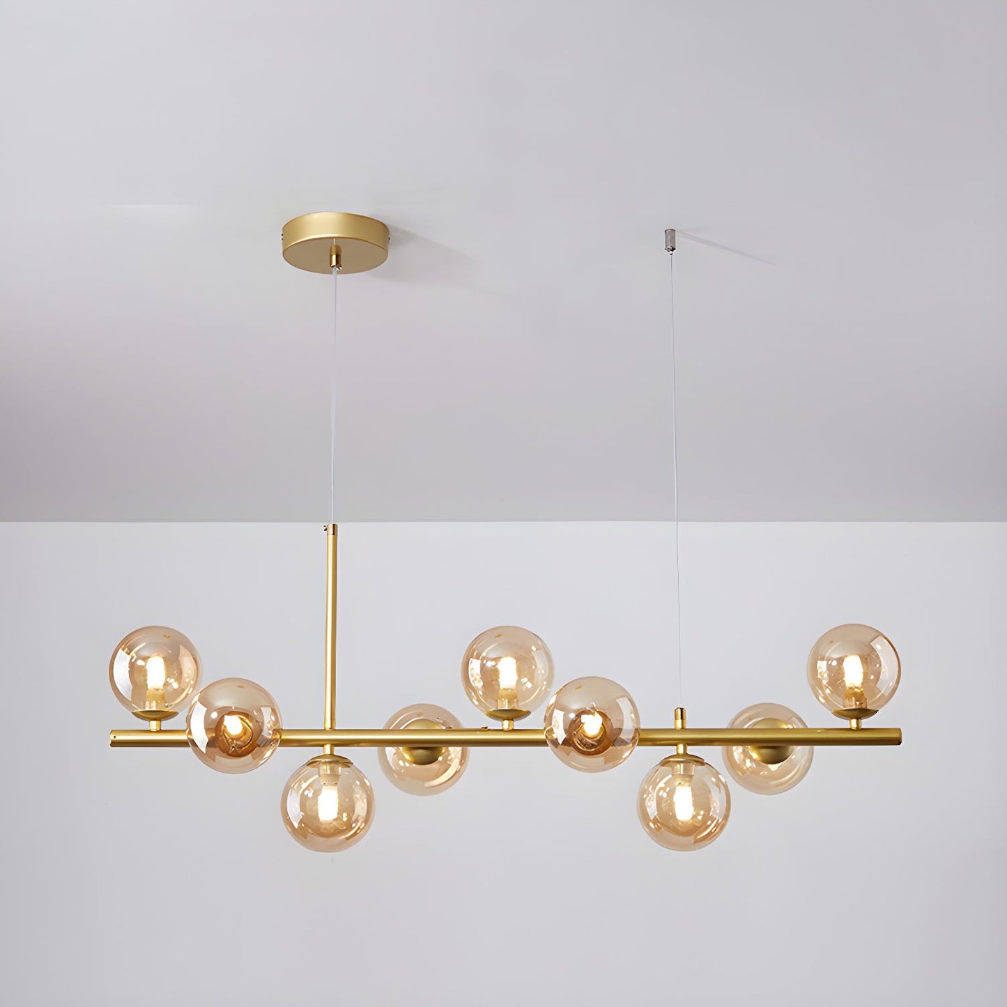 Aurelia Globe Chandelier 9-balls: ? 32.7″ x H 9.4″ / Gold / Amber 1001 Chandelier