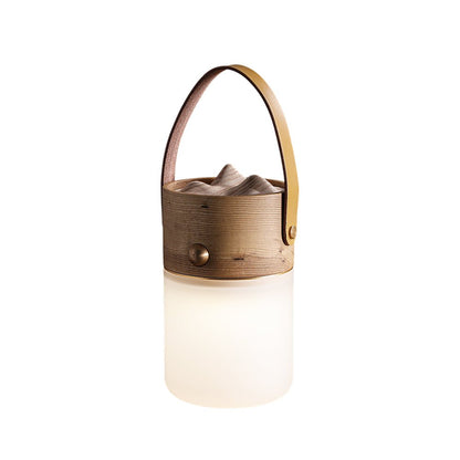 Nomad Lantern Table Lamp With hand strap Dia 3.9″ x H 6.3″ / Wood Color Table lamp
